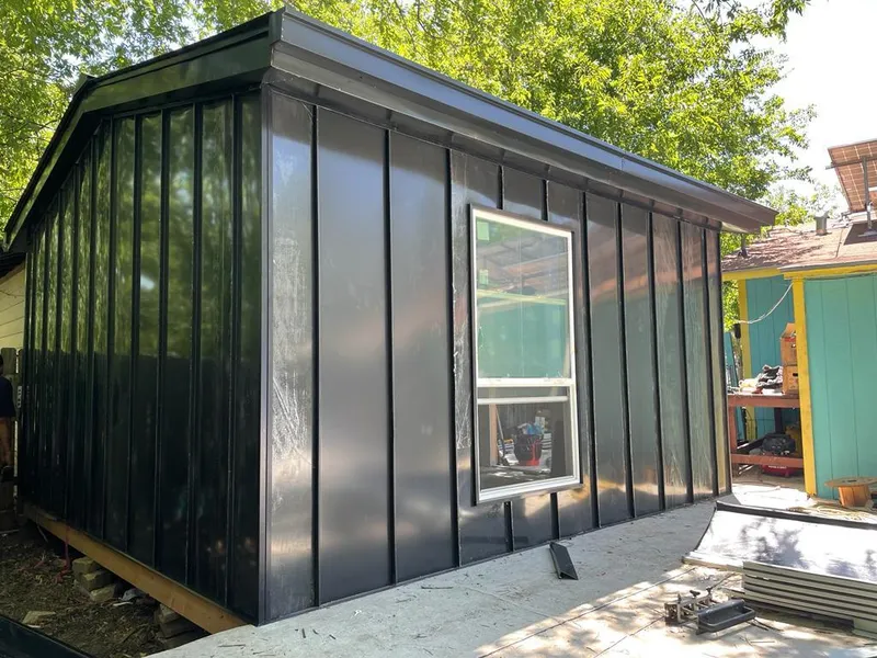 Black standing seam metal wall panels for Metal Roof Installation in Fallon